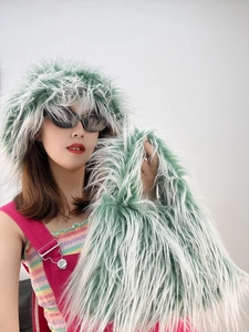 Detail shot of light green faux fur fluffy hat and matching plush handbag set