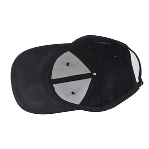 Detail of adjustable metal buckle and camouflage pattern on black baseball cap