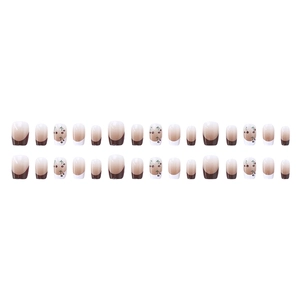Short square press-on nails with nude and dark coffee gradient and cherry patterns
