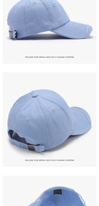 Detail of light blue distressed cotton baseball cap with torn brim and metal buckle