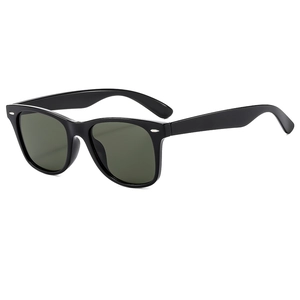 Classic square black sunglasses with green lenses shown from a 45-degree angle