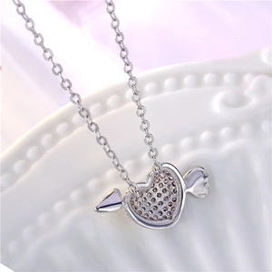 Platinum plated heart necklace with angel wings and sparkling cubic zirconia stones