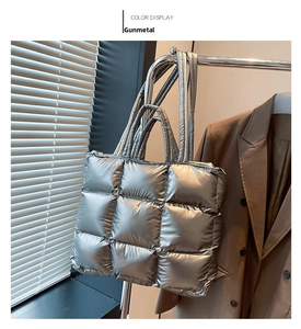 Dettaglio della borsa tote trapuntata canna di fucile metallizzata appesa in ufficio