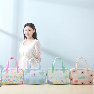Set of four portable PVC cosmetic bags with floral prints and top handles in pastel colors