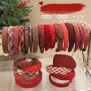 Elegant red winter headbands collection including velvet and tweed textures for women