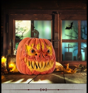Detailed close-up of spooky orange Jack-o'-lantern with sharp teeth on a wooden table