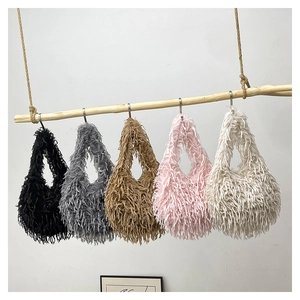 Faux fur hobo bags displayed in black, gray, camel, pink, and off-white colors