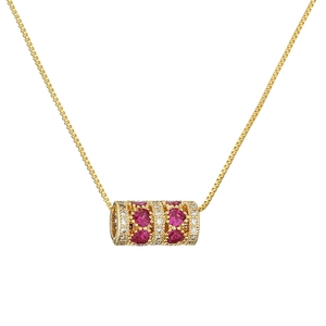 Gold cylinder pendant necklace with red heart gemstone and crystals on box chain