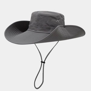 Detail of dark grey wide-brim sun hat with adjustable wind cord and side air vents