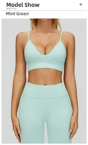 Front view of mint green seamless yoga set with V-neck sports bra and high-waist leggings