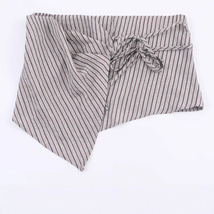 Women's grey striped shirt featuring bow-tie waist and asymmetrical pointed hemline