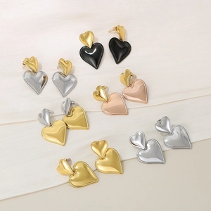 Two-tone heart-shaped stainless steel earrings in gold silver and rose gold finishes