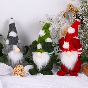 Three-piece Nordic Christmas gnomes set with snowflake hats in red, gray and green