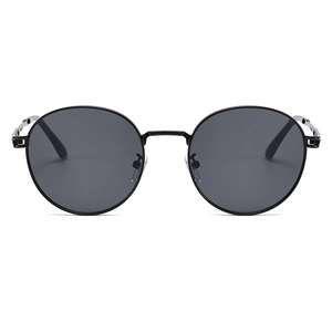 Retro round metal frame sunglasses with classic black lenses and minimalist chic temples