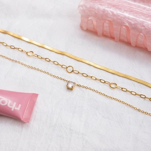 Three-layer gold stainless steel necklace set with snake chain and zircon pendant