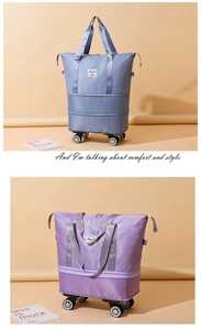 Detail view of expandable travel bags in grey and purple with 360-degree swivel wheels
