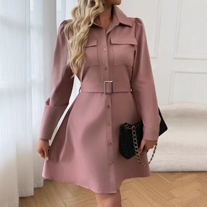 Detail of elegant dusty rose shirt dress with button-up front and buckled waist belt
