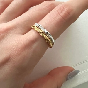 Elegant woven stackable S925 sterling silver rings in gold and silver braided design