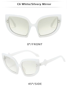Front and side views of oversized white cat eye sunglasses with silver mirror lenses