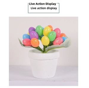 Detail of 12cm Easter egg planter with colorful glitter eggs and artificial greenery