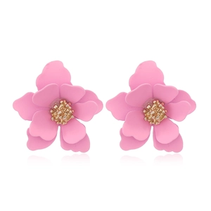 Elegant layered pink flower petal earrings with golden stamen and a polished finish