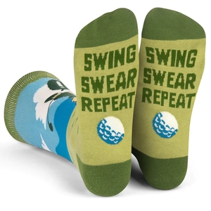 Detail of green cotton socks featuring white 'SWING SWEAR REPEAT' text and golf motifs