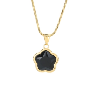 Elegant gold snake chain necklace featuring a black five-petal flower pendant with a star gem