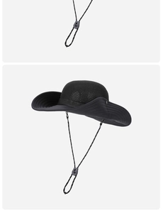 Detail of adjustable chin strap and breathable mesh on black outdoor wide brim sun hat
