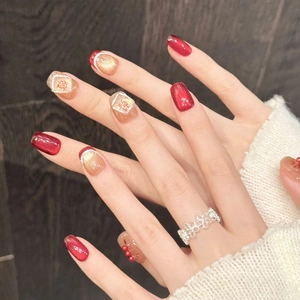 Uñas postizas festivas de ojo de gato rojas y doradas con perlas 3D y el carácter chino Xi