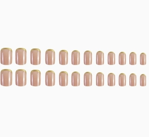 Detailed view of 24pcs nude press-on nails with shiny gold French tips on white background