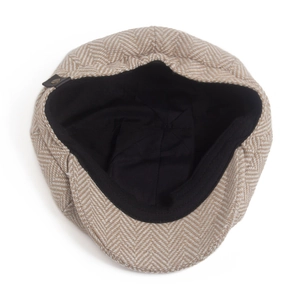 Classic herringbone newsboy cap in beige and white wool blend with interior leather tag
