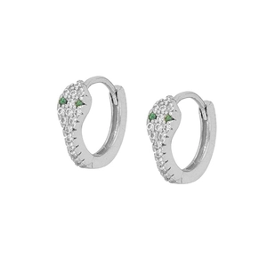 Detail of silver snake hoop earrings with micro-pave white crystals and green stone eyes
