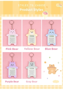 Detail of five mini bear calculators in pink, blue, yellow, purple, and gray with keychains