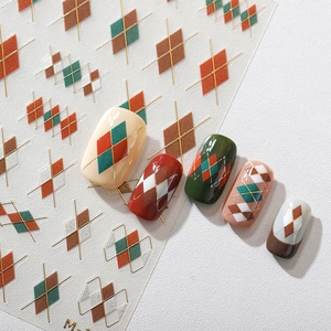 Lattice pattern nail art stickers with gold foil lines and vintage geometric designs