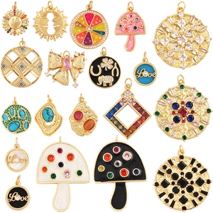 Golden North Star and mushroom charms with colorful enamel and cubic zirconia inlays