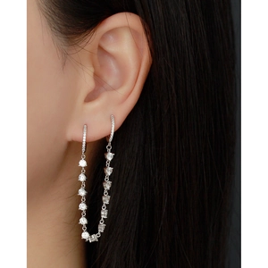 Luxury S925 sterling silver tassel earrings with sparkling crystals worn by model