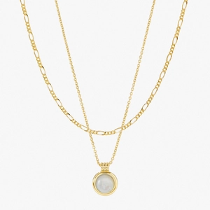 Double layer necklace with 24K gold Figaro chain and round white shell pendant