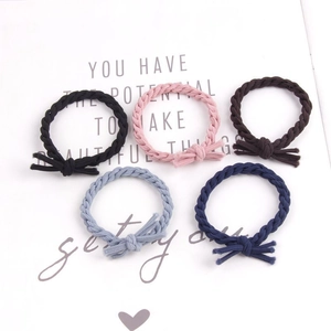 Set of 5 braided elastic hair ties with mini bow knots in assorted colors on card