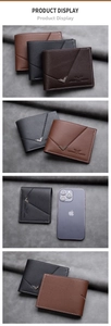Short leather bifold wallet with multiple card slots beside a smartphone for size comparison