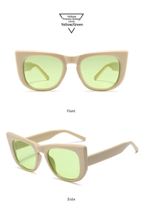 Front and side macro views of yellow cat eye sunglasses with green lenses