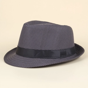 Close-up of the dark gray woven texture and black ribbon detail on a classic men's fedora