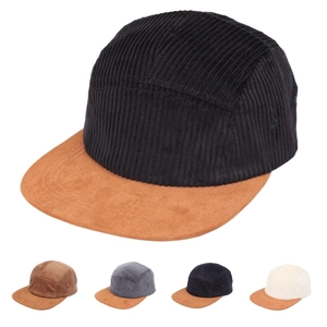 Detail of 5-panel corduroy baseball cap showing texture and suede brim in five colors