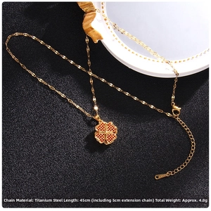 Detailed view of a gold-tone four-leaf clover necklace made of durable titanium steel