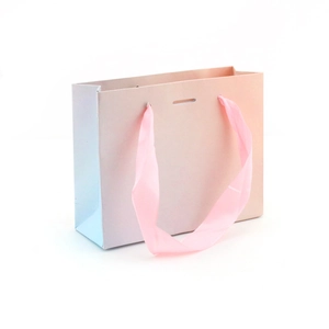 Pink and blue gradient gift paper bag with silk handles for jewelry packaging and storage