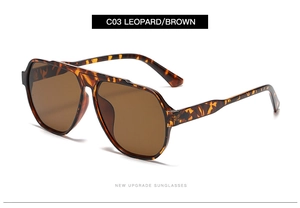 Detail view of leopard print frames and brown lenses for stylish pilot sunglasses