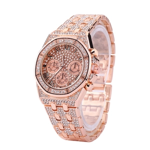 Rose gold watch with octagonal bezel and full rhinestones on Roman numeral dial