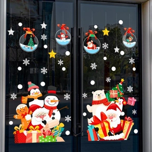 Stickers de Noël avec Père Noël, bonhomme de neige et pingouin sur porte vitrée