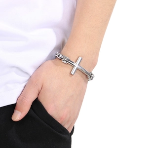 Retro rock cross bracelet in silver titanium steel on male wrist with byzantine chain