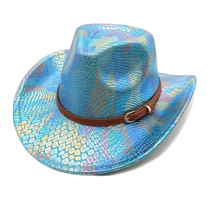Detail of holographic cowboy hat with snake texture and brown leather strap buckle