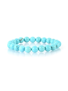 Close-up of sky blue turquoise beaded bracelet with natural black veining and mirror reflection